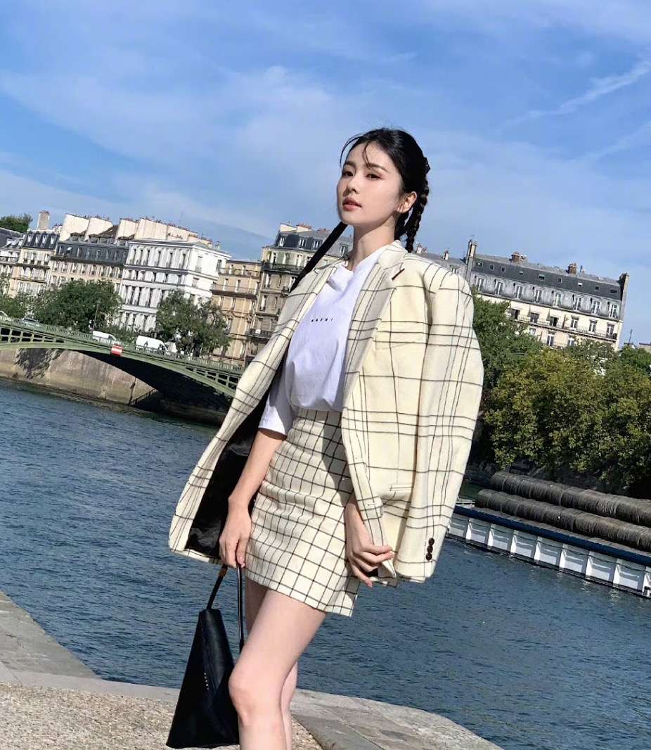 Bai Lu Poses for Pictures at Paris Fashion Week Marni Show