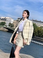 Bai Lu Poses for Pictures at Paris Fashion Week Marni Show